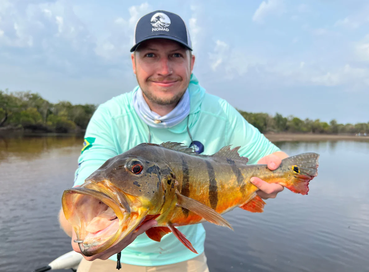 angler-posing-with-peacock-bass-2